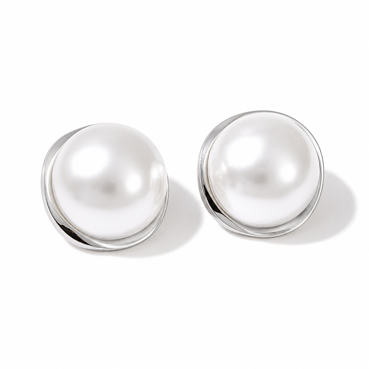 Aretes medias perlas