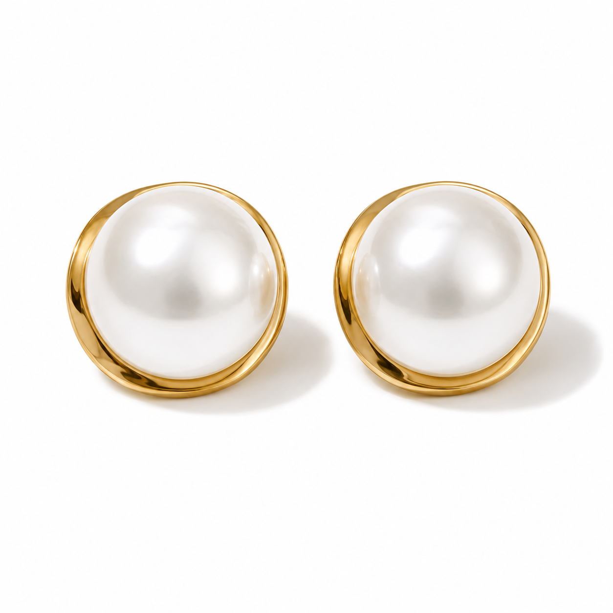 Aretes medias perlas